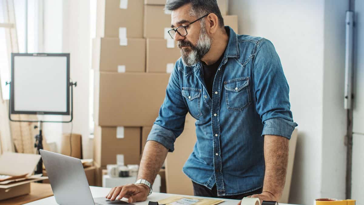 eCommerce business owner on computer.