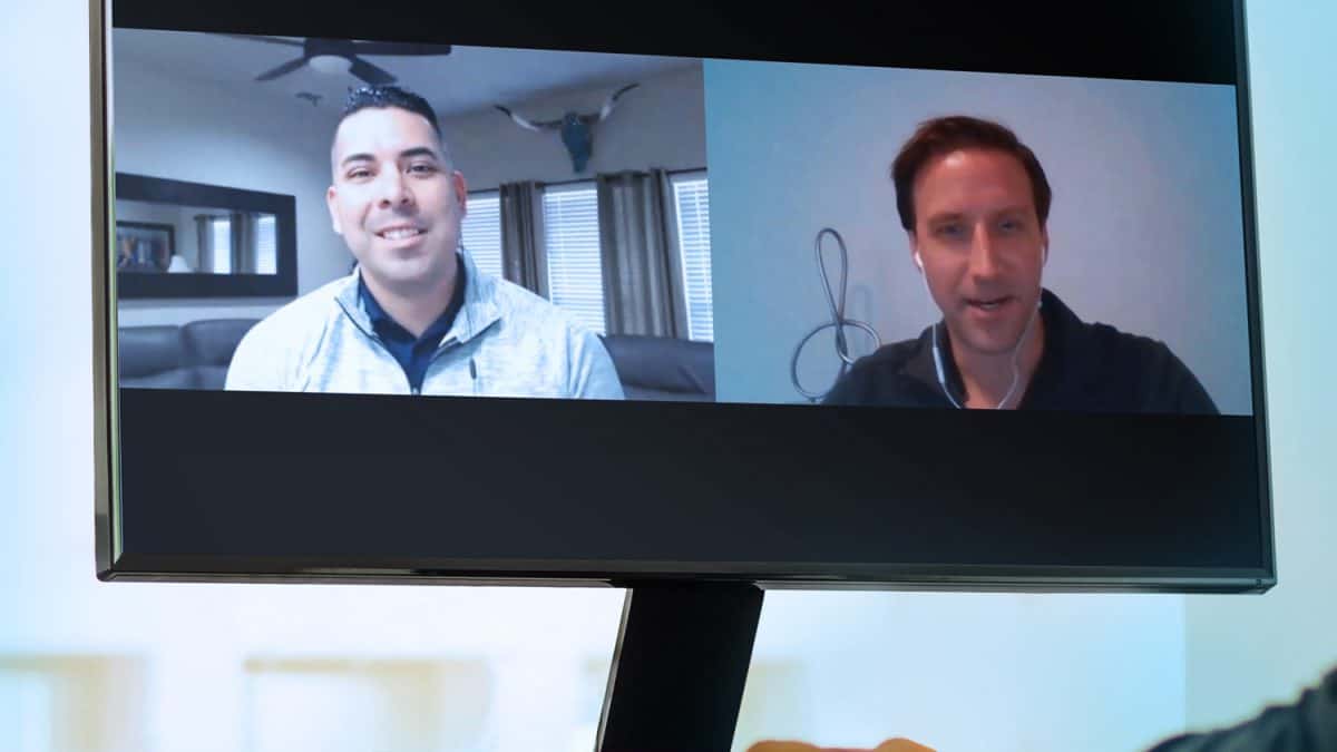 Desktop screen shows picture of Tim and Adrian Luna