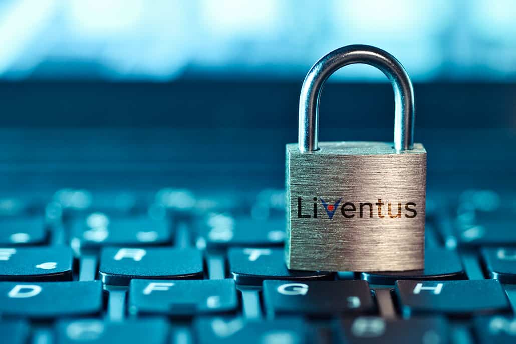 lock with liventus logo placed on laptop keypad