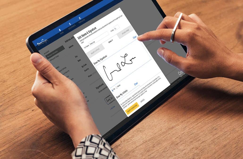 tab in a persons hand with DocuSign app open