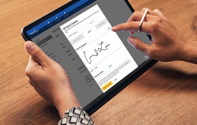 tab in a persons hand with DocuSign app open