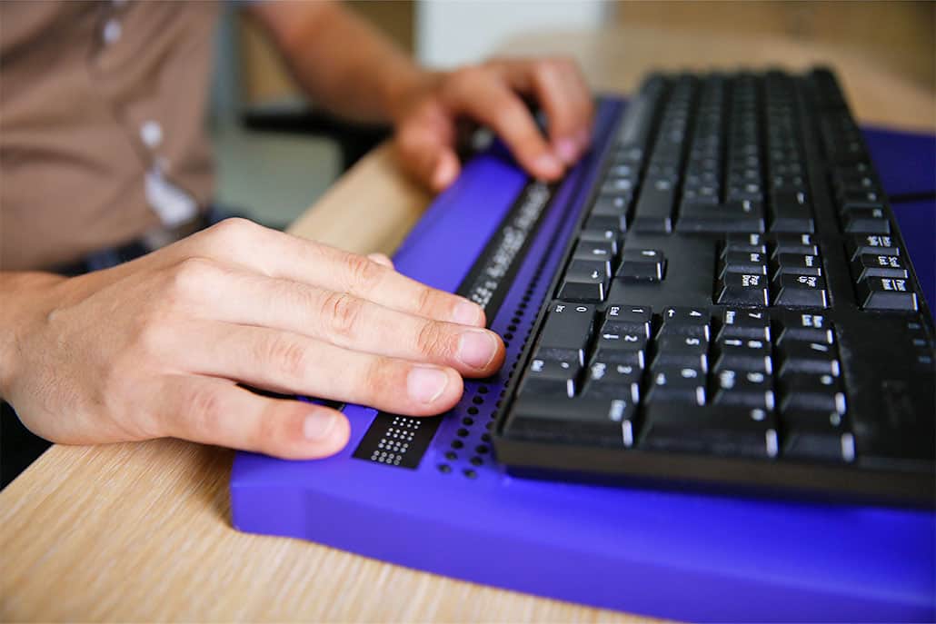 specially abled person using computer keyboard